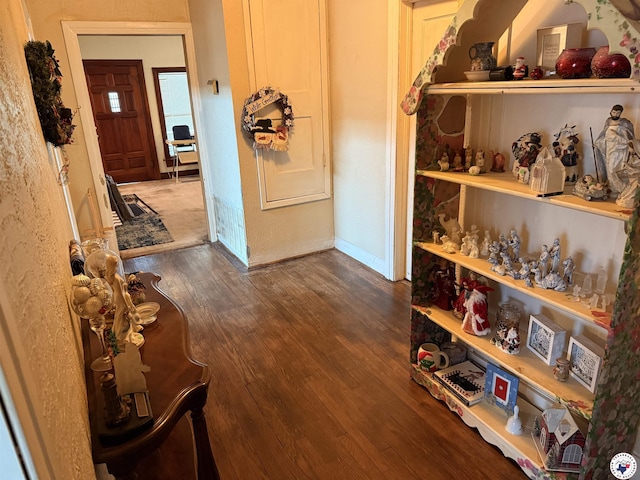 hallway featuring dark wood-style flooring