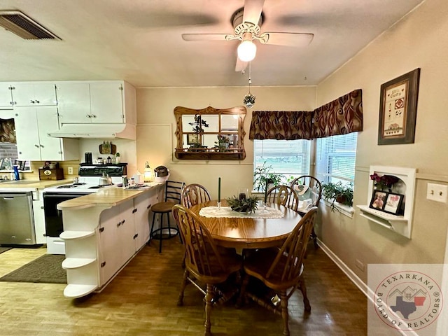 dining area featuring ceiling fan and hardwood / wood-style floors