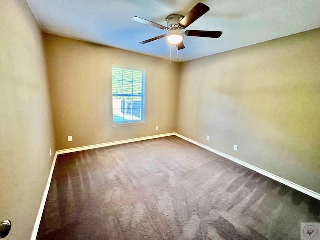 empty room with carpet floors and ceiling fan