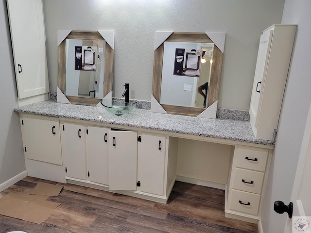 bathroom featuring hardwood / wood-style flooring