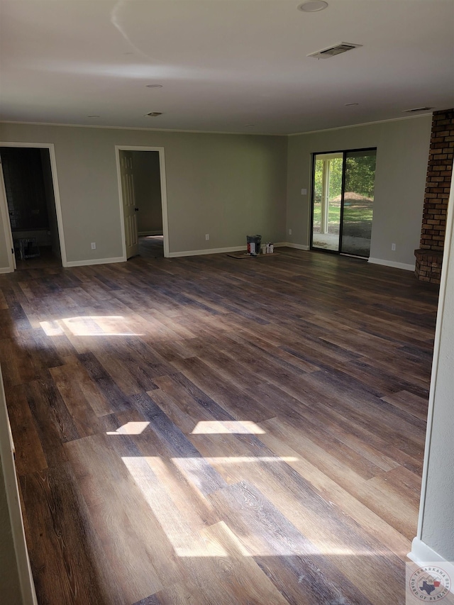 empty room with hardwood / wood-style floors