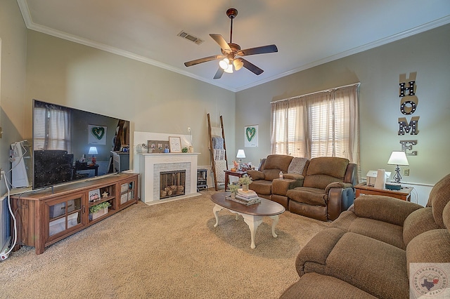 carpeted living room featuring ceiling fan, a brick fireplace, and ornamental molding