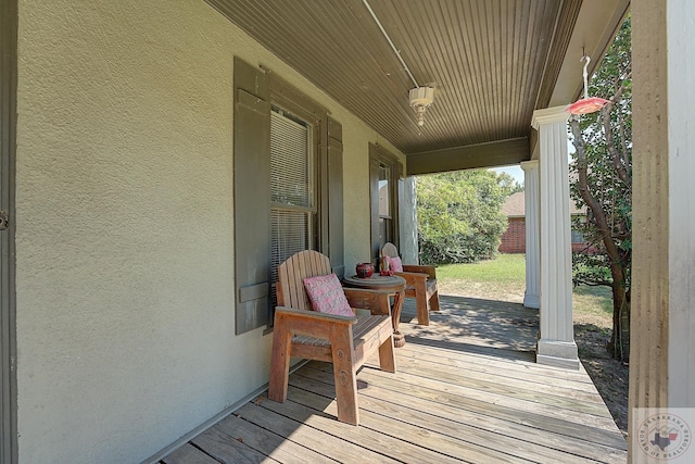 deck with covered porch