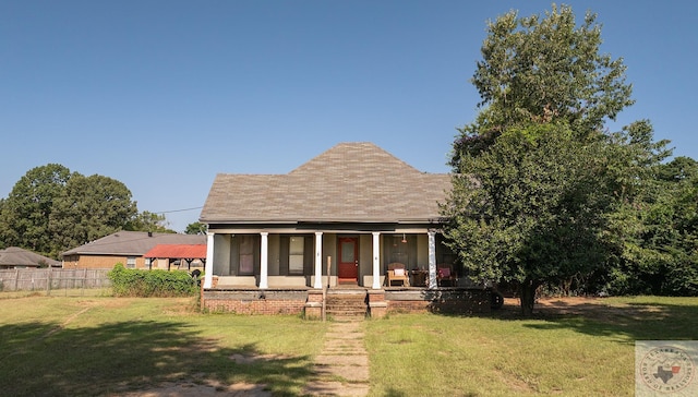 bungalow-style house with a front lawn