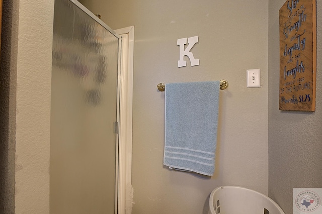 bathroom with an enclosed shower