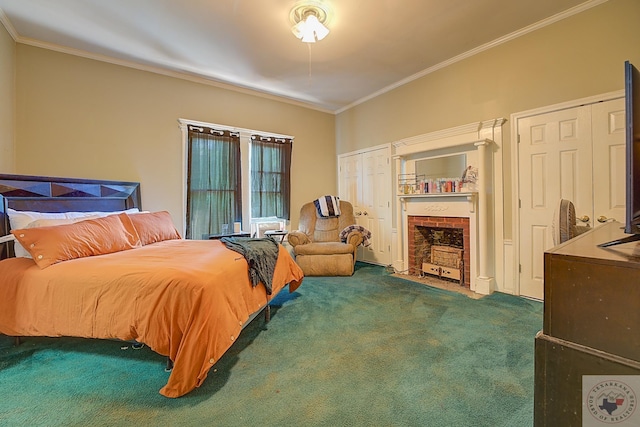 carpeted bedroom with two closets, ornamental molding, and a fireplace