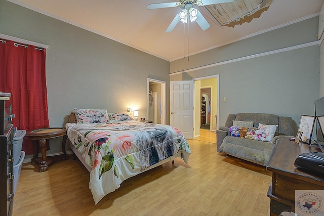 bedroom with ceiling fan, ornamental molding, and light wood-type flooring