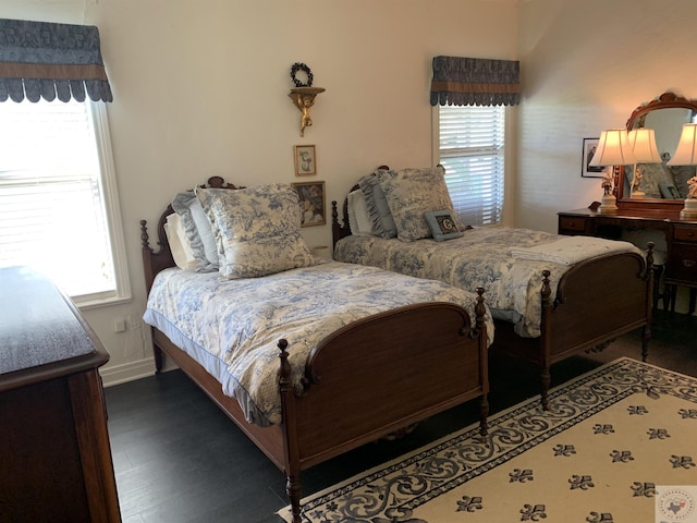 bedroom featuring dark hardwood / wood-style floors