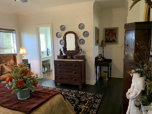 living room featuring ornamental molding and dark hardwood / wood-style flooring