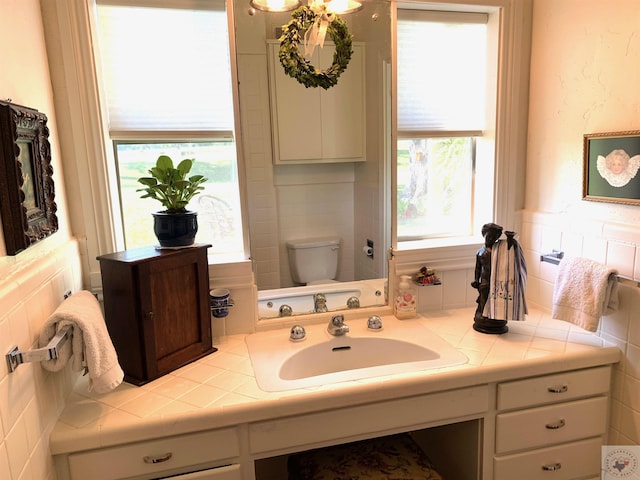 bathroom featuring sink and toilet