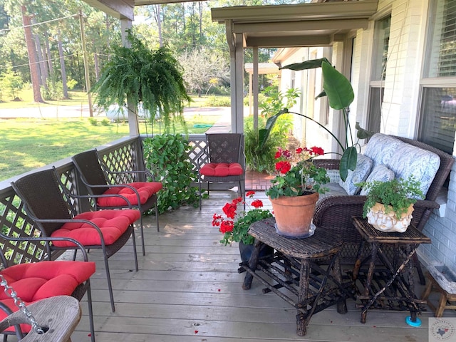 wooden deck featuring a porch