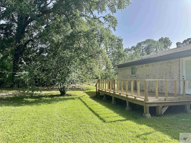 view of yard with a deck