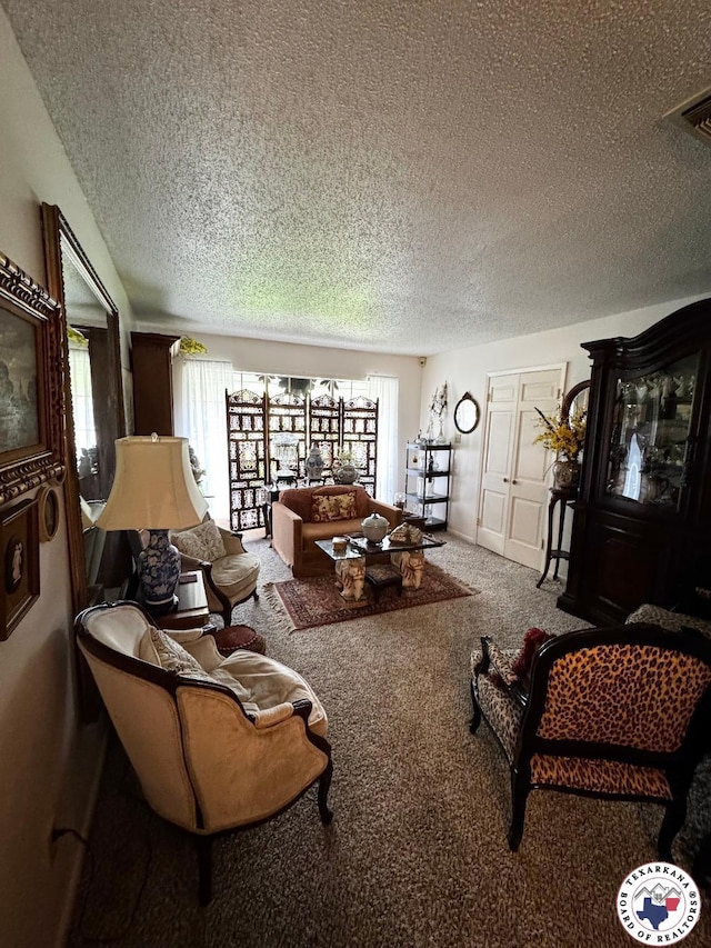 1509 W 40th St, Texarkana, TX 75503 - carpeted living room with a textured ceiling
