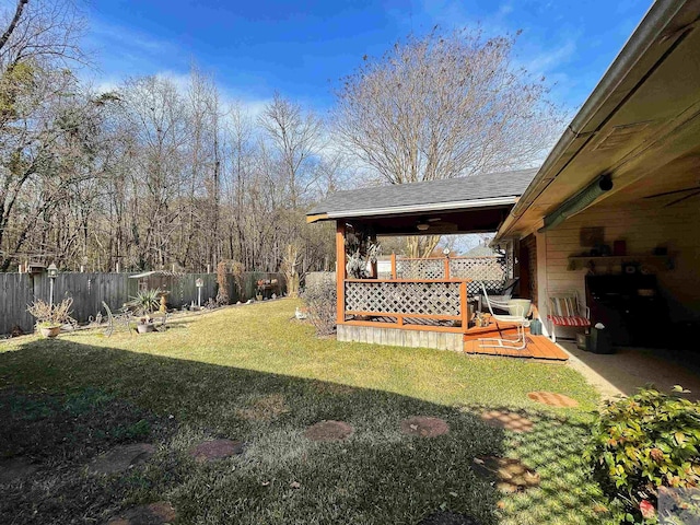 view of yard featuring a deck