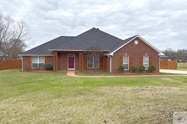 ranch-style home with a front lawn