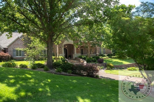 view of front of home with a front yard