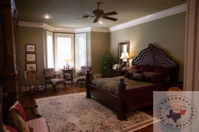 bedroom featuring ceiling fan, ornamental molding, and dark wood-type flooring