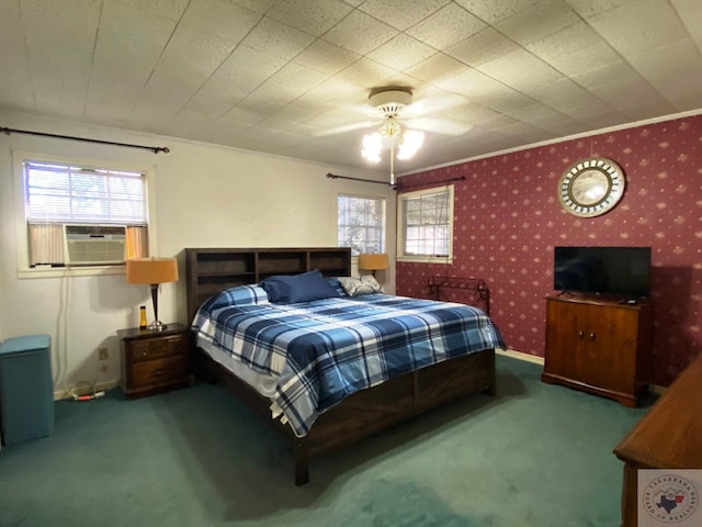 carpeted bedroom with ceiling fan, cooling unit, and ornamental molding