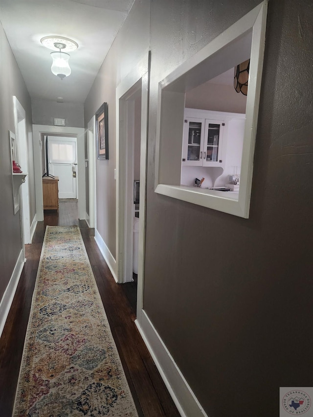 hall featuring dark hardwood / wood-style flooring