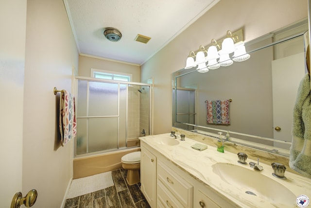 13 Holly Ridge Dr, Texarkana, TX 75503 - bathroom with ornamental molding, bath / shower combo with glass door, double vanity, and wood finished floors