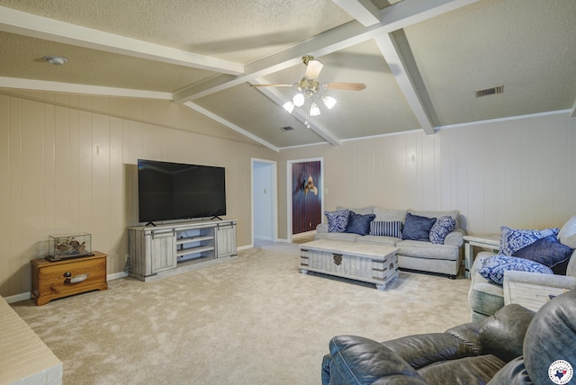 13 Holly Ridge Dr, Texarkana, TX 75503 - living area featuring beamed ceiling, a ceiling fan, carpet, and a textured ceiling
