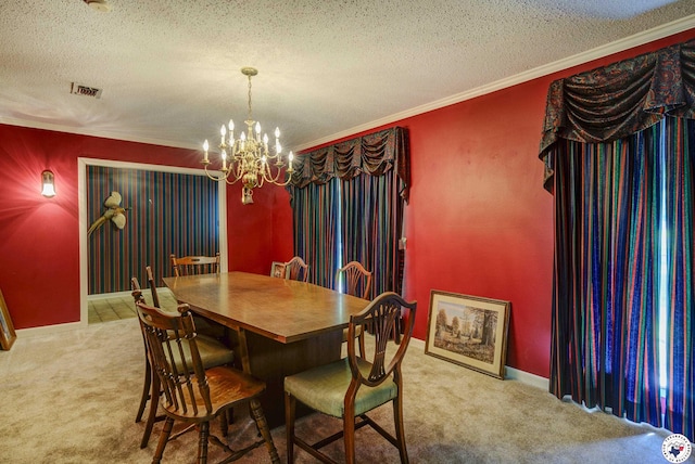 13 Holly Ridge Dr, Texarkana, TX 75503 - carpeted dining space featuring a chandelier, a textured ceiling, and crown molding