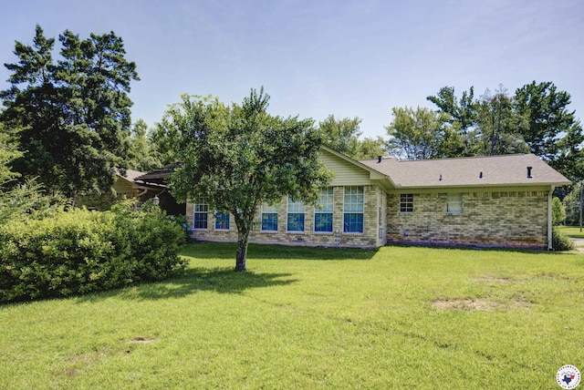 13 Holly Ridge Dr, Texarkana, TX 75503 - view of front of property with a front yard and brick siding