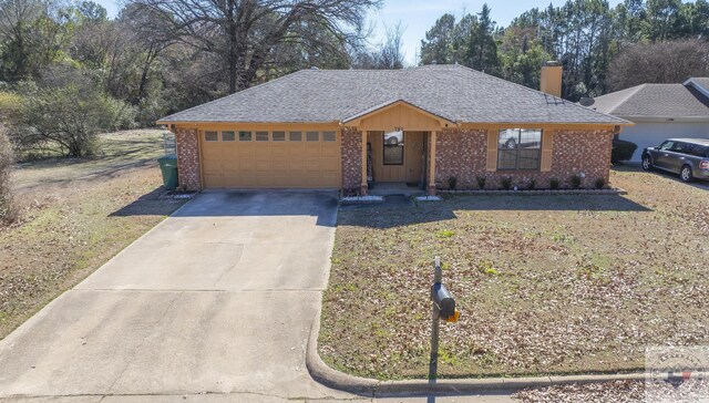 ranch-style home with a garage