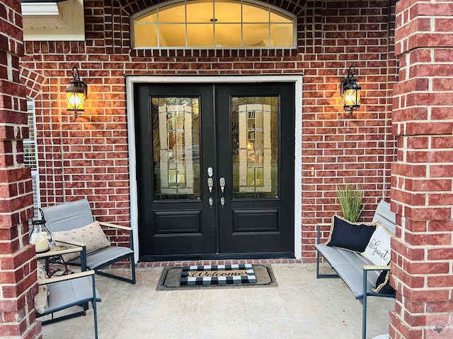 entrance to property featuring french doors