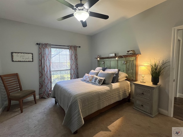 carpeted bedroom featuring ceiling fan