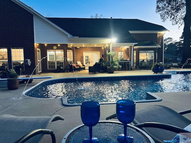 view of pool featuring a patio area