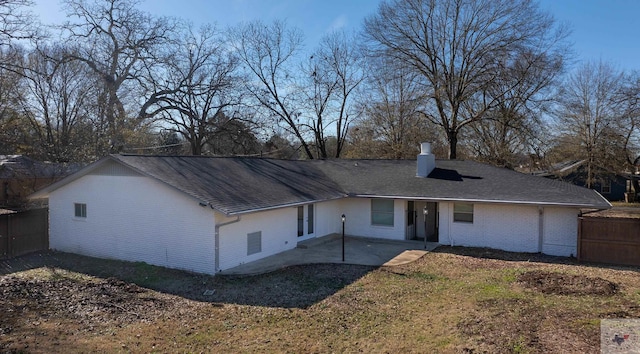 rear view of house with a patio