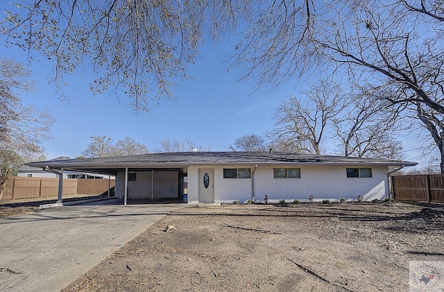 ranch-style home with a patio