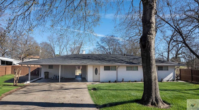 single story home with a carport and a front yard