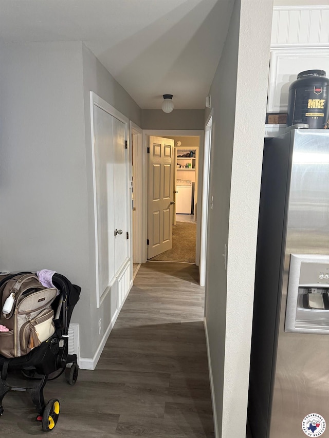5440 Calico Duck Rd, Texarkana, AR 71854 - corridor with wood finished floors and washer / clothes dryer