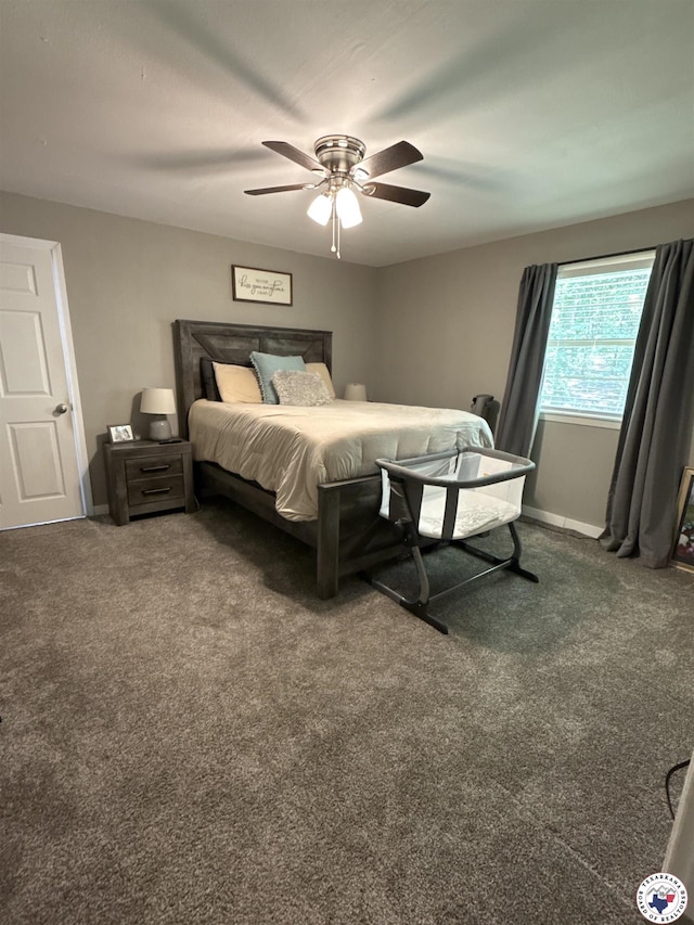 5440 Calico Duck Rd, Texarkana, AR 71854 - carpeted bedroom with a ceiling fan and baseboards
