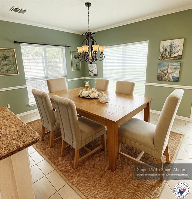 7311 Shilling Cir, Texarkana, TX 75503 - dining room featuring light tile patterned floors, a chandelier, ornamental molding, and baseboards