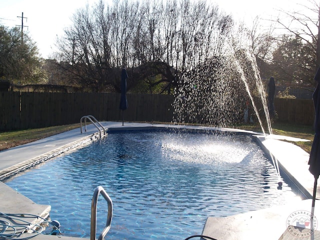 7311 Shilling Cir, Texarkana, TX 75503 - view of pool featuring a fenced backyard