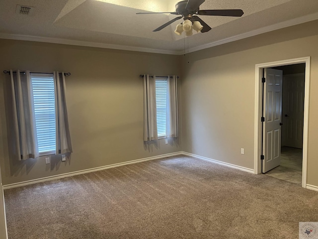 7311 Shilling Cir, Texarkana, TX 75503 - carpeted spare room featuring ornamental molding, a ceiling fan, baseboards, and plenty of natural light