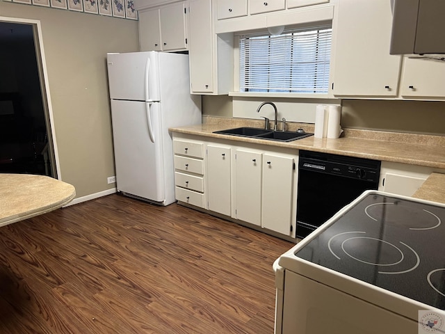 kitchen featuring white cabinetry, sink, white appliances, and dark hardwood / wood-style flooring