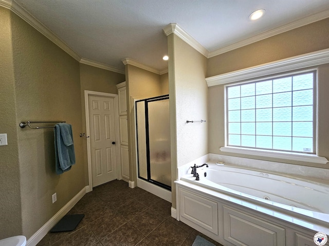 bathroom featuring crown molding, tile patterned flooring, a garden tub, and a stall shower