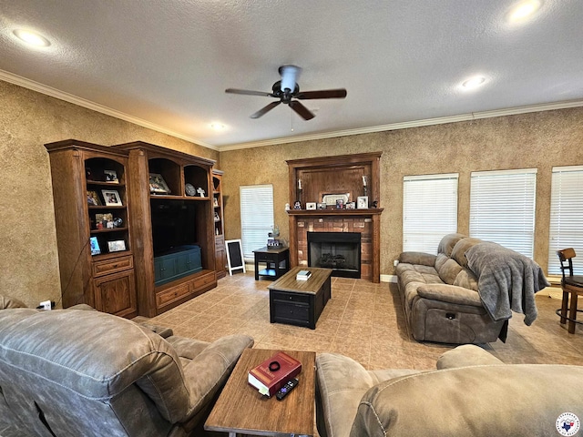 living area with crown molding, ceiling fan, and a wealth of natural light
