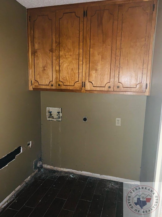 laundry area featuring cabinets and washer hookup