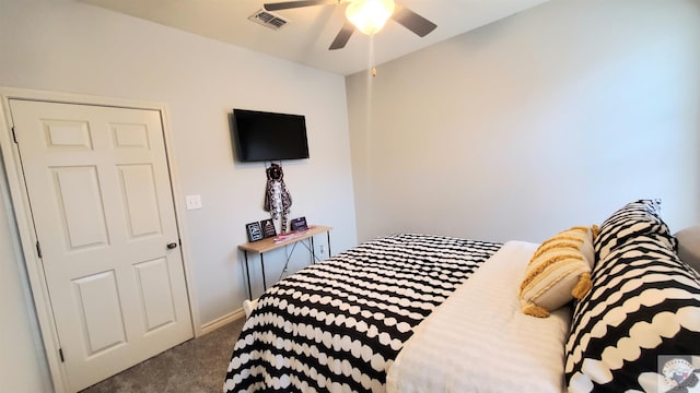 carpeted bedroom with ceiling fan