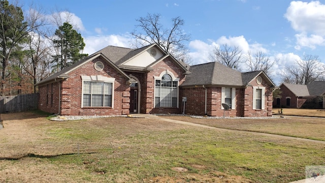 front facade with a front lawn