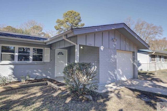 view of front of home featuring a garage