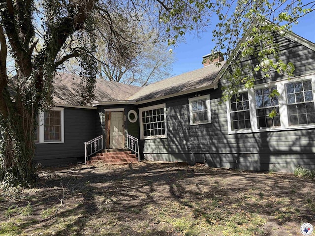 1100 W Jackson St, Clarksville, TX 75426 - view of front of house with a chimney
