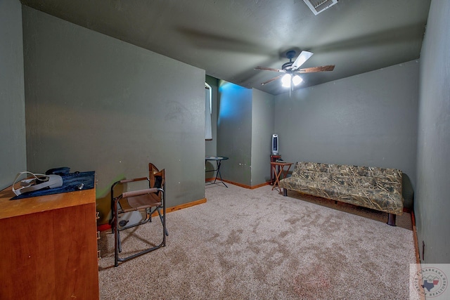 bedroom featuring ceiling fan and carpet