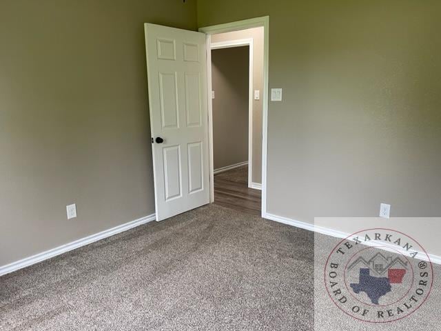 empty room featuring carpet