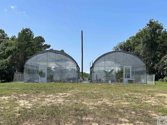 view of yard with an outdoor structure